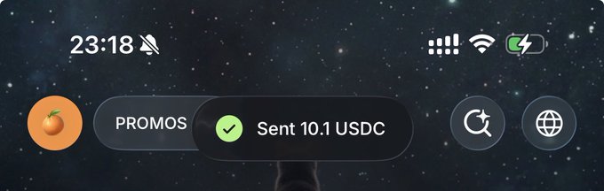 A mobile status bar at 23:18 displays a 'PROMOS' button, refresh and globe icons, and a notification reading 'Sent 10.1 USDC' with a checkmark.