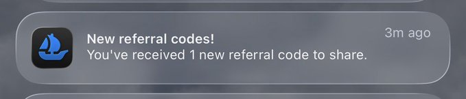 A push notification with a blue sailboat icon reading 'New referral codes! You've received 1 new referral code to share.'