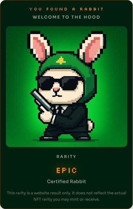 A digital collectible card featuring a pixel-art rabbit in a green hoodie and sunglasses holding a gun, with text 'YOU FOUND A RABBIT', 'WELCOME TO THE HOOD', 'RARITY: EPIC', and a disclaimer about NFT rarity.
