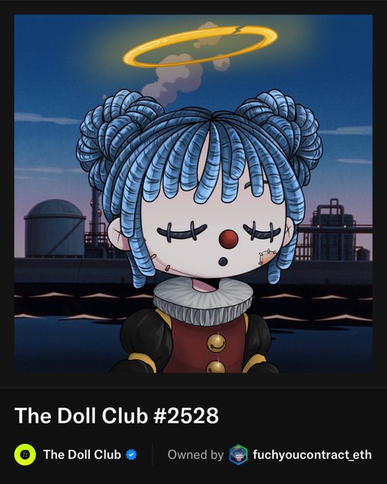 An NFT digital artwork titled "The Doll Club #2528" depicts a sad clown-like doll with blue braids and a halo, owned by "fuchyoucontract.eth" on the blockchain.