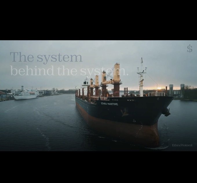 A photograph of a large cargo ship named 'EDYRA MARITIME' docked in a harbor, overlaid with the text 'The system behind the system.' and an 'Ethra Protocol' logo in the bottom right corner.