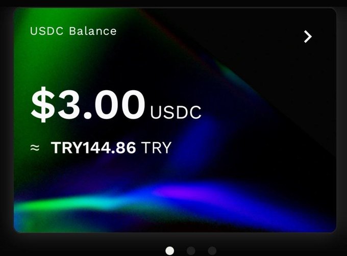 A mobile wallet screen showing a 'USDC Balance' of '$3.00 USDC' equal to 'TRY144.86 TRY' against a dark, colorful background.