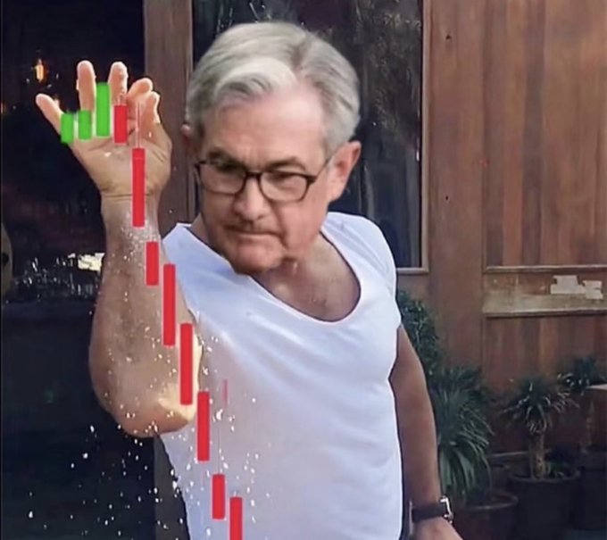 An older man with glasses wearing a white t-shirt is pouring something from his raised hand, with a red declining bar graph descending across his body.