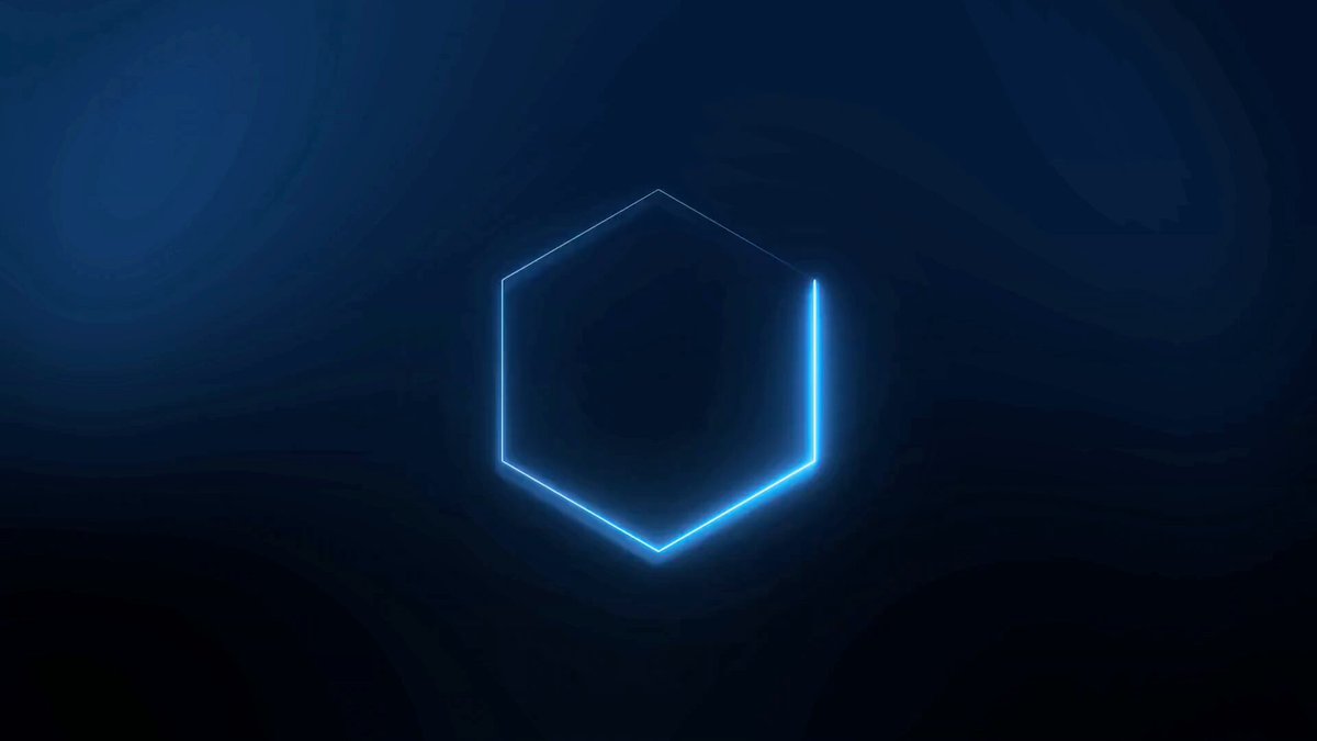 The image features a hexagon-shaped design that appears to be glowing blue neon against a dark background. The hexagon is positioned centrally within the frame, drawing attention to its vibrant color and unique shape. The surrounding darkness emphasizes the striking contrast between the illuminated hexagon and its environment. The post discusses the reasons behind developing on Solana from the start, highlighting the benefits of using Solana's blockchain technology for performance and cost-effectiveness.