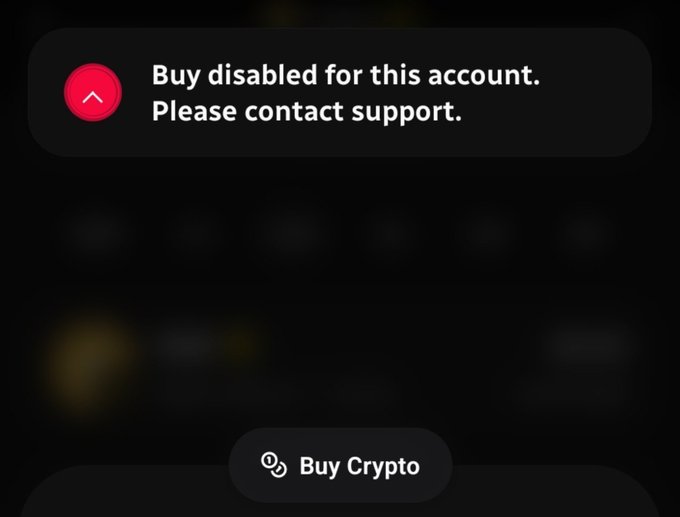 A dark-themed app screen displaying a notification 'Buy disabled for this account. Please contact support.' with a 'Buy Crypto' button at the bottom.