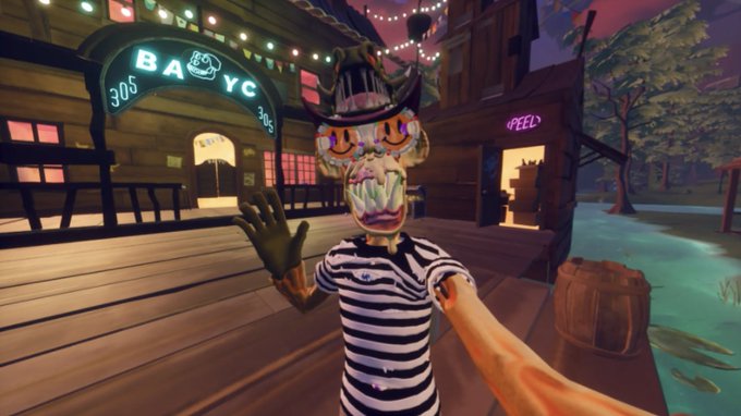 A first-person view from a VR game shows a creepy clown-like character wearing a striped shirt and cowboy hat reaching out from a wooden boardwalk area with neon signs reading 'BAYO 305' and 'PEEL'.