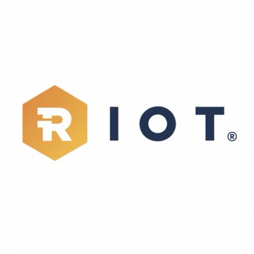 The image displays the Riot Platforms logo, featuring an orange hexagon with a white "R" alongside the dark blue "RIOT" wordmark and a registered trademark symbol, identifying the company referenced in the news about their major Bitcoin sale and strategic pivot toward AI infrastructure.