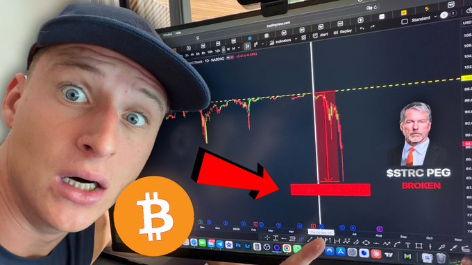 The image shows a man wearing a baseball cap looking at a computer monitor, which displays a Bitcoin chart with a red warning sign next to an arrow indicating a significant drop in Bitcoin prices. The main message of the image is that there is a huge Bitcoin danger signal, and it might be time to sell some Bitcoins or be cautious while trading them.