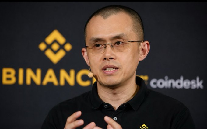 Binance founder Changpeng Zhao (CZ), wearing a black polo with the Binance logo, speaks at a CoinDesk event. The image accompanies discussion of his prediction that Bitcoin could surpass gold's market value in the next bull run.