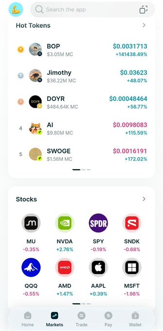 The image shows the Bitget Wallet app displaying "Hot Tokens" like BOP and Jimothy, alongside various stocks such as MU, NVDA, SPY, AMD, AAPL, and MSFT. This visually supports the claim that the wallet now offers more than just crypto management.