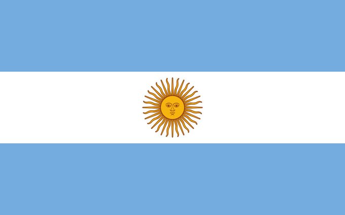 The image shows the flag of Argentina, featuring three horizontal bands of light blue and white, with a golden Sun of May emblem in the center. This flag visually represents Argentina, the country mentioned in the post about its upcoming policy to automatically share crypto transaction data with global tax authorities by September 2029.