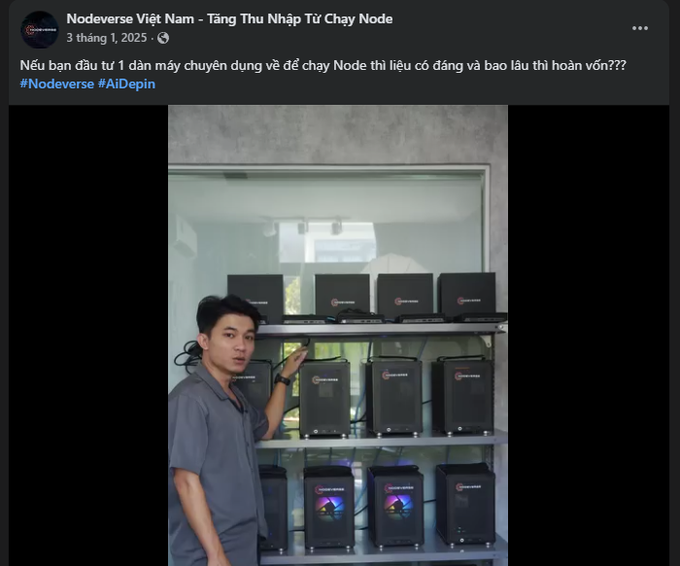 The image shows a man standing next to a shelf filled with black computer servers, likely for sale or display purposes. The man appears to be posing for a photo while surrounded by these servers. The background of the image features a window, which could potentially be part of a store or showroom setting.