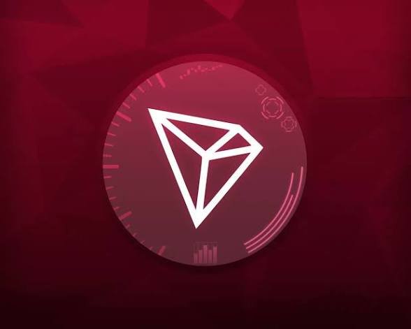 A digital graphic featuring a white geometric diamond/prism logo inside a translucent pink circle against a dark magenta background with polygonal patterns.