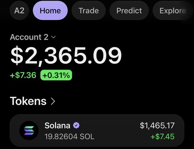 A screenshot of a crypto portfolio app showing Account 2 with a total balance of $2,365.09 (+0.31%), holding 19.82604 SOL (Solana) valued at $1,465.17. The image aligns with the post's ambition to grow the approximately 20 SOL holding into 200 SOL.