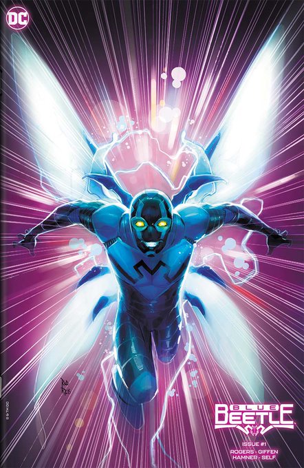 DC Blue Beetle comic book cover (Issue #1) featuring the superhero in blue armor with glowing yellow eyes and luminous wings flying forward with energy effects.