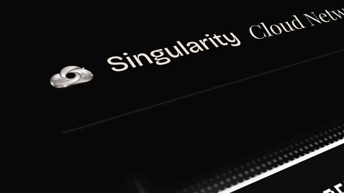 The image features a black background with white text that reads "Singularity Cloud Network". The text is centered, making it easy to read. Below this title, there are two descriptions of the product being launched - "As our next product, tokenized Compute Markets gets closer to launch." and "Time to put those Mac Minis to work. Check your DMs." These descriptions provide context for what the post is about.