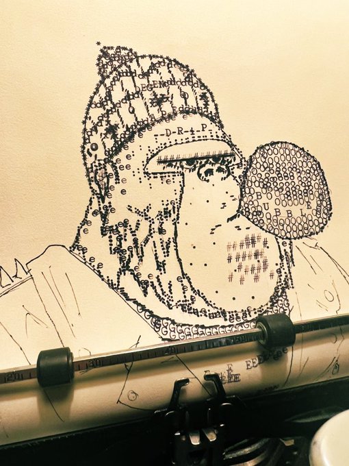 An ASCII art typewriter drawing of a person with a pipe, incorporating letters, numbers, and symbols to form the image, displayed on a typewriter.