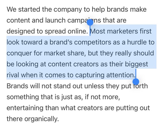 A text excerpt about marketing strategy with a highlighted passage reading 'Most marketers first look toward a brand's competitors as a hurdle to conquer for market share, but they really should be looking at content creators as their biggest rival when it comes to capturing attention.'