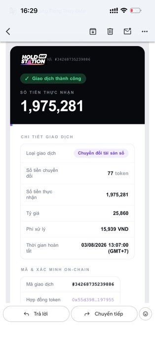 A mobile screenshot of a successful HoldStation transaction for 77 tokens, showing a total received amount of 1,975,281 and a transaction fee of 15,939 VND.