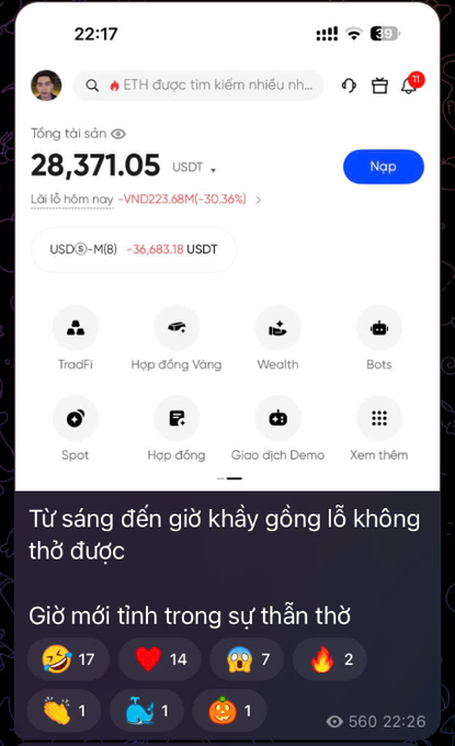 A smartphone screenshot of a Vietnamese cryptocurrency trading app showing a total balance of 28,371.05 USDT, a daily loss of -30.36%, and menu options like TradFi, Spot, and Demo.