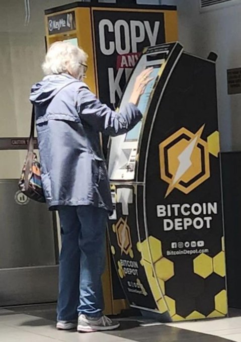 An elderly woman with white hair using a Bitcoin Depot ATM kiosk in what appears to be a store, with the machine's black and yellow branding clearly visible.