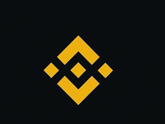 A gold Binance logo on a black background, representing the BNB side of the "#Solana MEME or #BNB MEME?" comparison.