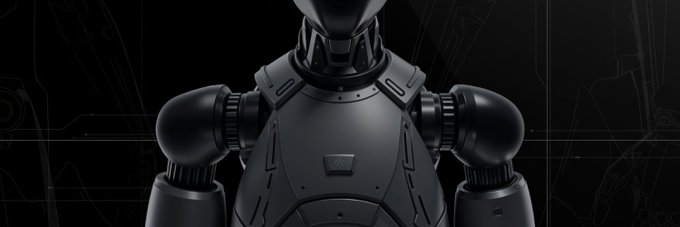 The image features a robot with a black body, arms, and legs standing against a dark background. The robot appears to be made of metal or plastic, giving it a futuristic appearance. It's positioned centrally within the frame, drawing attention to its design and structure. The caption below the image provides context about the post, stating that it was quite interesting for many reasons, including the recent DEUS TGE from @xmaquina on Virtuals and in partnership with Aerodrome on Base.