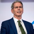 Scott Bessent speaks at a podium, with a quote about the Clarity Act being on the "1-yard line" in the Senate, highlighting its potential to unlock hundreds of billions in Bitcoin investment and open crypto markets to major institutional sectors.