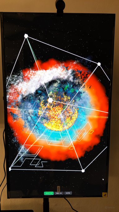 A digital artwork titled "Dark Matter" displayed on a monitor, featuring a vibrant cosmic explosion of orange, red, blue, and white hues overlaid with geometric white line formations and nodes against a starry black background. The piece visually represents the artist's theme of "dark matter" through its nebula-like, energetic composition, celebrating its recent acquisition by the collector mentioned in the post.