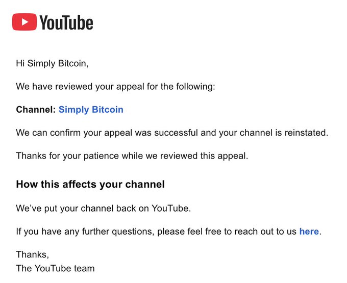 A YouTube notice to “Simply Bitcoin” says the appeal was successful and the channel is reinstated, with the message signed “The YouTube team.”