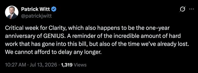 A tweet from White House Executive Director Patrick Witt (@patrickjwitt) posted on July 13, 2026, reads: "Critical week for Clarity, which also happens to be the one-year anniversary of GENIUS. A reminder of the incredible amount of hard work that has gone into this bill, but also of the time we've already lost. We cannot afford to delay any longer." The post shows 1,319 views and ties directly to the accompanying news update, where Witt emphasizes the urgency of passing the Clarity Act.