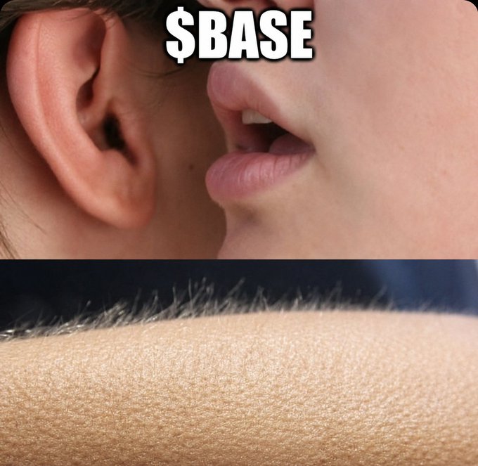 The image features a close-up of an ear with a lip, which appears to be speaking or whispering into someone's ear. The background of the image is black, making the ear and lips stand out prominently. The caption "Something big is coming! $BASE" is written in white text above the image, likely indicating that there is a significant event or announcement related to the base.