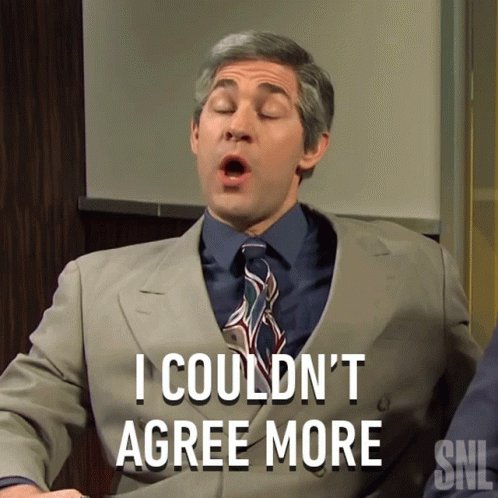 The image features a man wearing a suit, with his mouth open as if he's about to speak or shout. He has gray hair and is sitting down, possibly at a desk or in an office setting. The text "I Couldn't Agree More" is written above him, which appears to be part of the same post that contains the image.