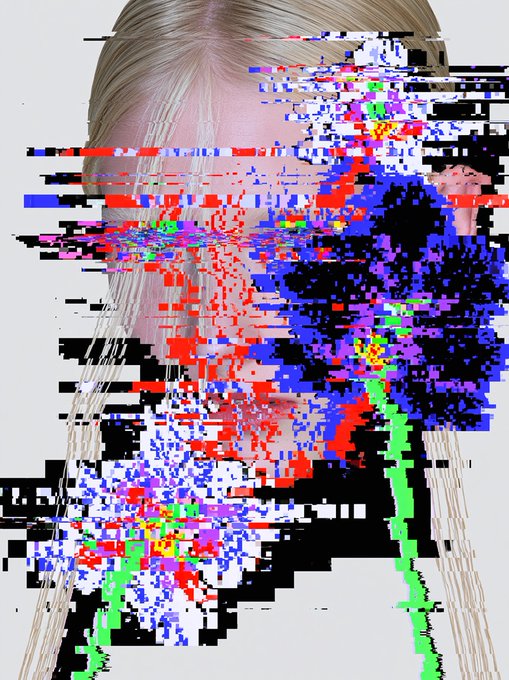 An image of a blonde woman whose face and upper body are heavily obscured by digital glitch art with horizontal bands of red, blue, green, and black pixels.