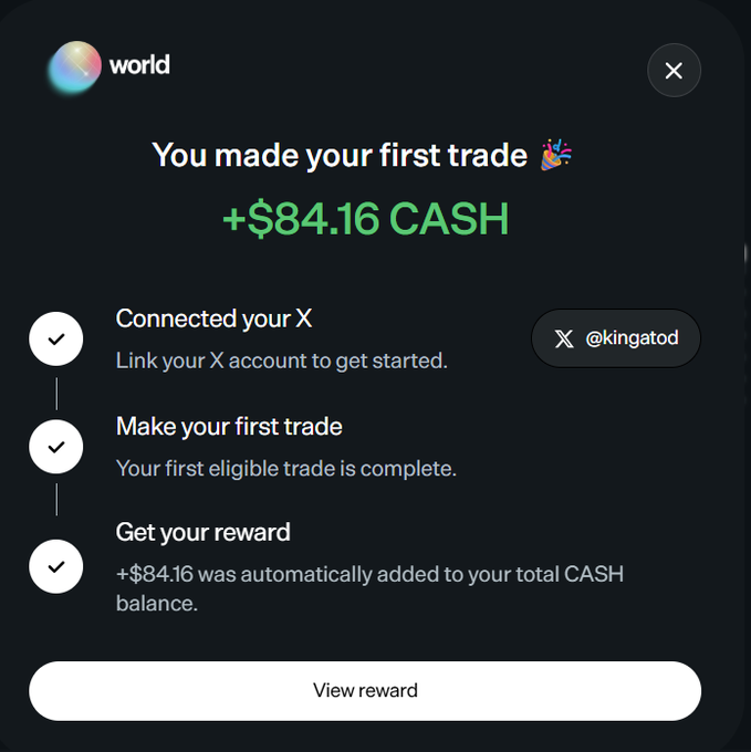 A 'world' app pop-up notification congratulates the user 'You made your first trade' and awards '+ $84.16 CASH', showing the connected X account as @kingatod.