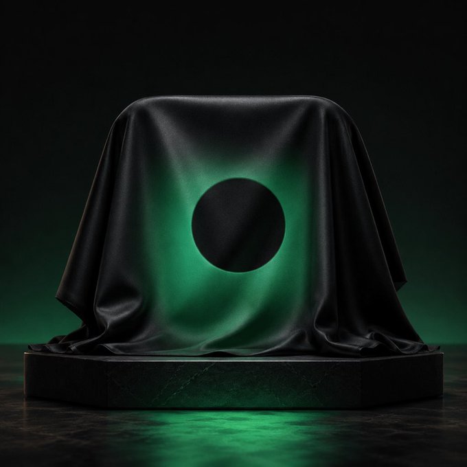 A black cloth drapes over a mysterious object on a hexagonal platform, illuminated from within by a green glow that forms a circular pattern, evoking an unrevealed product or logo. The image complements the post's "Day 20 of positioning with @rerollgg until launch," symbolizing the anticipation and secrecy surrounding an upcoming release.