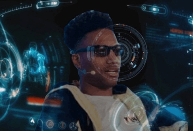 A person wearing AR glasses and a hoodie interacts with a futuristic holographic interface featuring various circular displays and data readouts, humorously captioned as if commanding "Jarvis" to remove a sell button—playing on the Iron Man-style AI assistant trope to poke fun at disabling trading functionality.