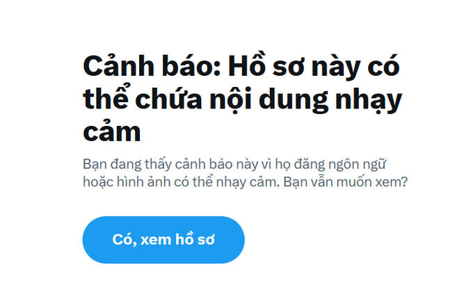 A Vietnamese content warning screen reading "Cảnh báo: Hồ sơ này có thể chứa nội dung nhạy cảm" with a blue button labeled "Có, xem hồ sơ".