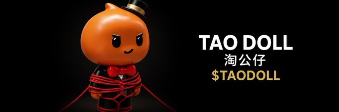 A promotional image for 'TAO DOLL' featuring an orange character wearing a small top hat and a red bow tie wrapped in red rope.