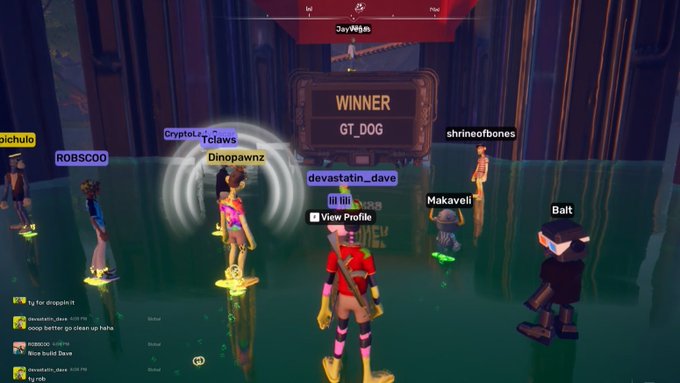 A video game victory screen shows 'WINNER GT_DOG' with multiple player avatars standing in a watery arena; player names like 'Dinopawnz', 'Makaveli', and 'shrineofbones' appear above the characters.