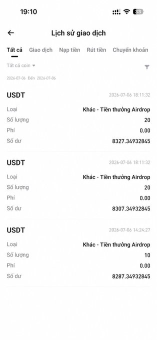 A Vietnamese transaction history screen (Lịch sử giao dịch) showing USDT airdrop rewards being received between July 4-6, 2026.