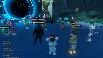 Players in a virtual game world with usernames like 'Zack - William', 'Husher', 'FFRacer', and 'Udischka' explore a blue-tinted landscape with glowing creatures.