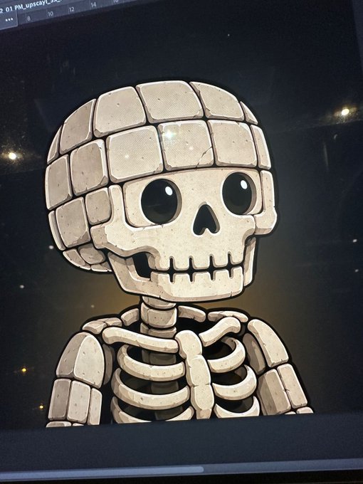 A digital illustration of a cute cartoon-style skeleton with a large rounded skull and big black eyes, displayed on a screen.