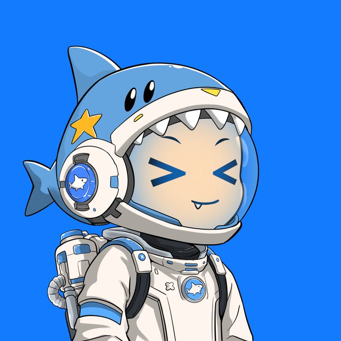 A cute cartoon character wearing a blue shark-themed astronaut helmet and a white spacesuit with a star emblem, set against a solid blue background.