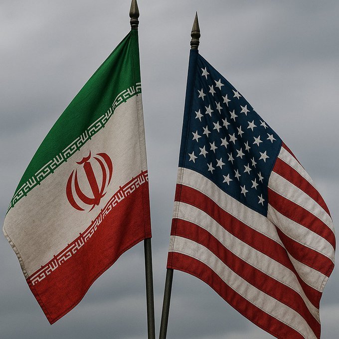 The image features two flags - an American flag and a flag with Iran written on it. The flags are attached to poles that stand upright against a cloudy sky backdrop. Below the flags, there's text that reads "We need altcoins $XLM did well, walked strong". This message seems to be related to Bitcoin or cryptocurrency, as indicated by the reference to "Altcoins" and "walked strong", which could possibly be referring to Bitcoin mining or blockchain technology.

The image also contains a watermark in the bottom right corner that reads "$BTC PUMP 67300". This watermark might indicate that the image was taken by someone who is associated with Bitcoin or cryptocurrency, such as a Bitcoin miner or an enthusiast of digital assets.