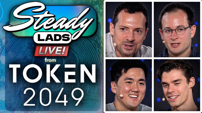 Promotional thumbnail for "Steady Lads LIVE! from TOKEN 2049" featuring headshots of four podcast hosts wearing headset microphones, with text referencing Episode #104 where Taiki Maeda reveals his $ZEC stop loss and Justin Bram discusses selling 100% of his position.