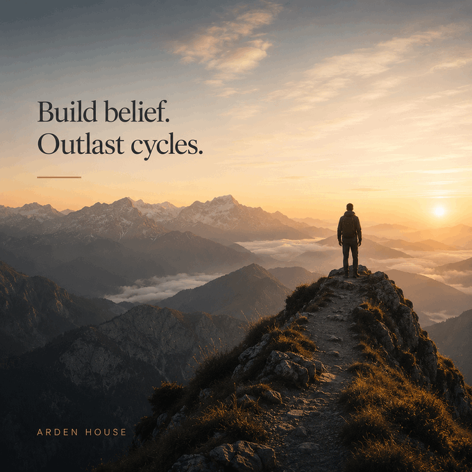 A lone figure stands atop a mountain ridge at sunrise, gazing over vast peaks with the text "Build belief. Outlast cycles." and the "ARDEN HOUSE" logo. The imagery of enduring summits and the dawn beyond mirrors the post's message that long-term crypto winners like $BTC, $HYPE, $TAO, and $SOL thrive by building conviction that outlasts short-term attention cycles.