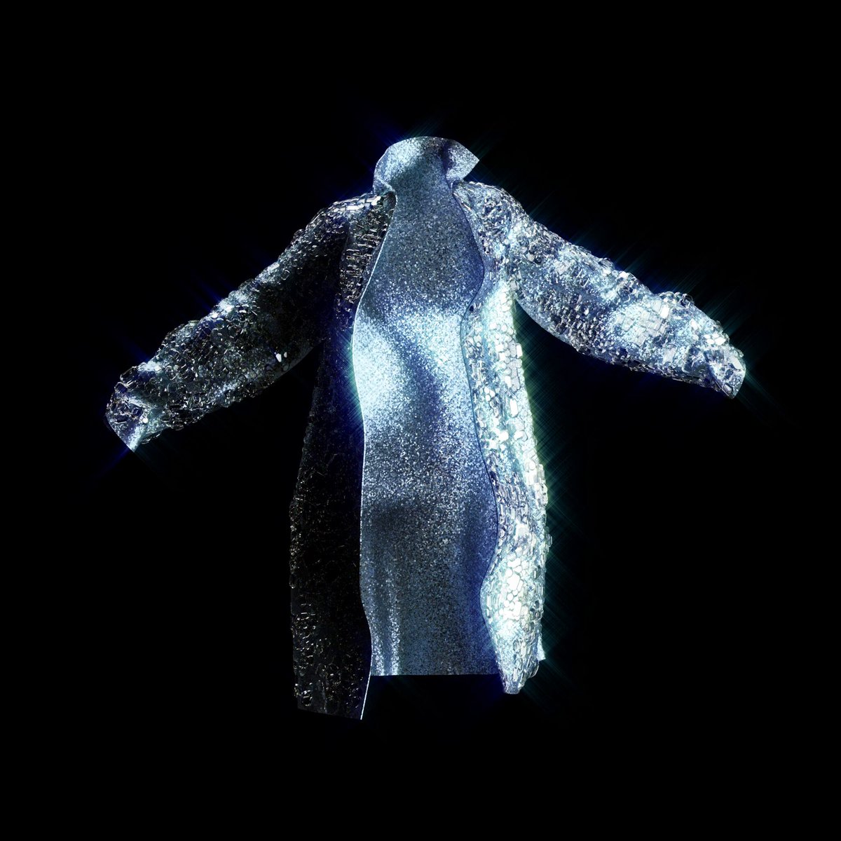 The image features a silver dress that has been cut open, revealing its inner workings. The dress appears to be made of shiny fabric or sequins, giving it an ethereal glow against the black background. The dress is displayed prominently on the right side of the image with the caption "The top 5 things I'm most excited about for Chimpers right now". This suggests that there are five specific aspects of the dress that the person is particularly excited about or interested in, and they would like to share these details with others.