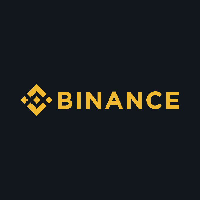 The image shows a logo of the cryptocurrency Binance that has been updated for the year 2020, with the word "Binance" written in yellow letters against a black background. The updated logo also includes a new symbol, a triangle with a diamond shape at its center and a yellow border around it. This change signifies the transition from the old logo to the new one, which is relevant to the post about tokenized stocks that was shared earlier.