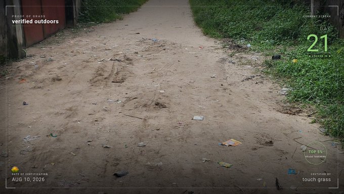 A screenshot from 'PROOF OF GRASS: verified outdoors' displaying a litter-strewn dirt path with a 'DAY 21' counter and certification date 'AUG 10, 2026'.